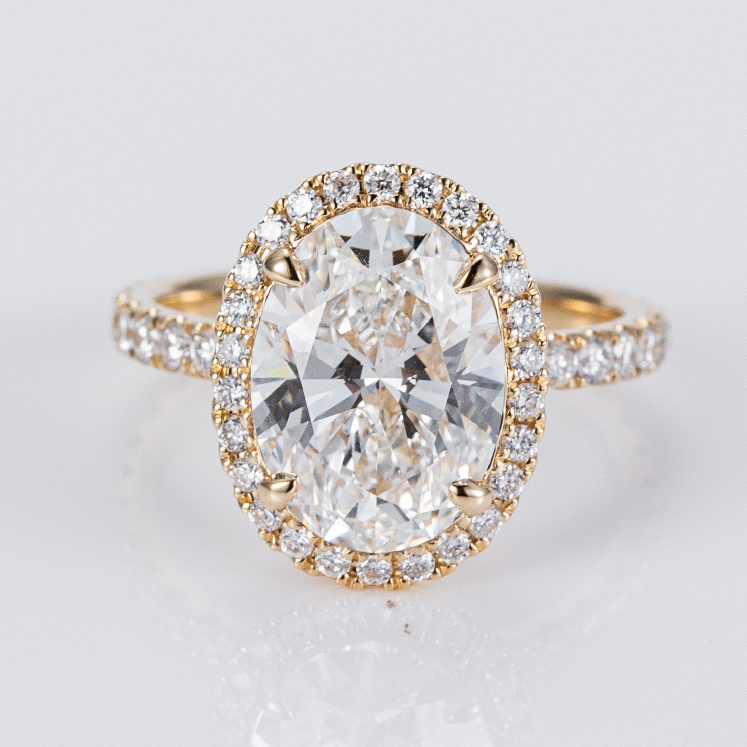 SOLD. Custom 3.2ct LG Oval set in 14ky with LG Diamond Halo, Available to order.
